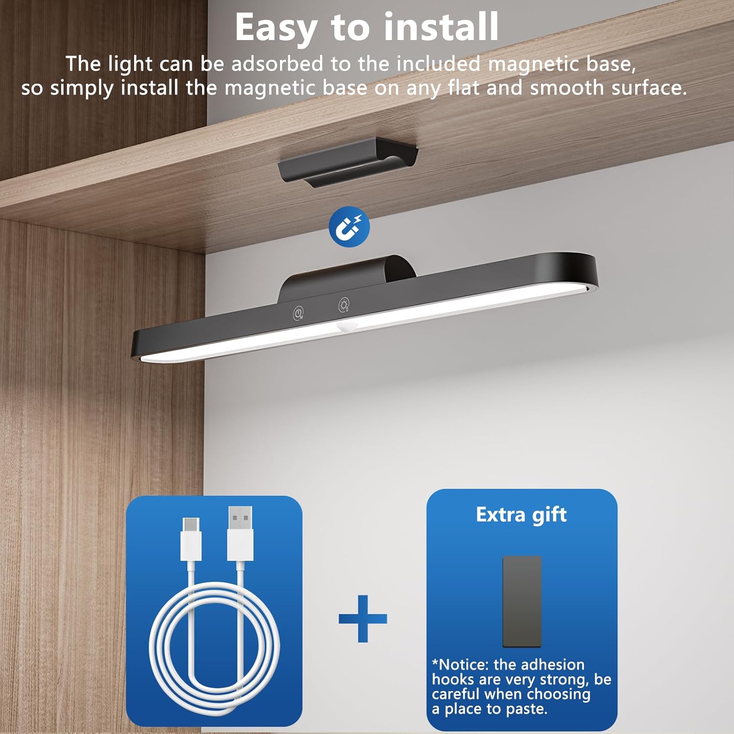 Under-cabinet LED light with magnetic base吸附功能, USB cable, and extra gift on a wooden surface.