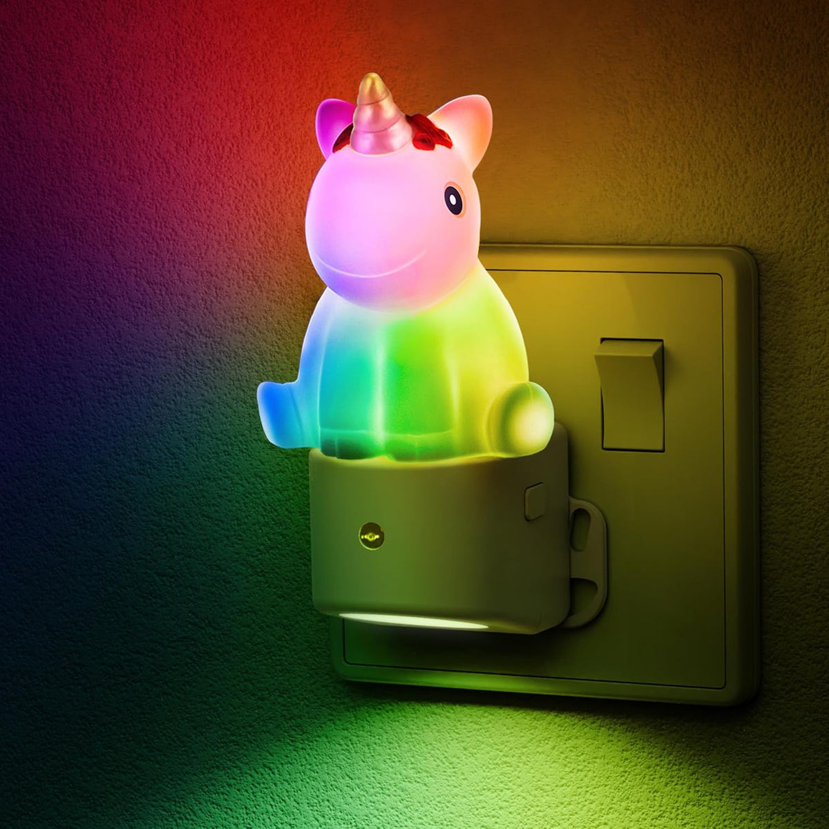 Unicorn-shaped night light attached to a wall switch with colorful lighting.