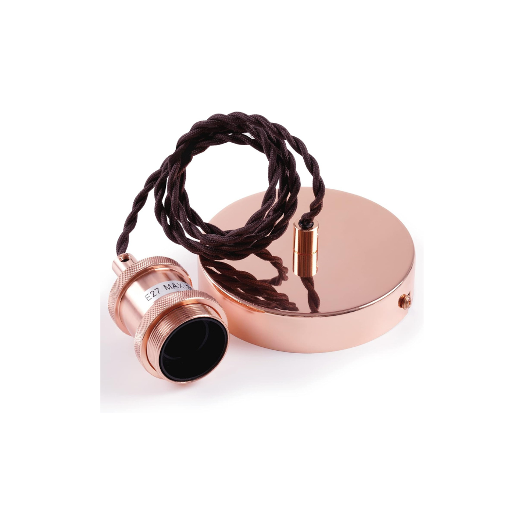 Rose gold pendant light with black cord on a white background