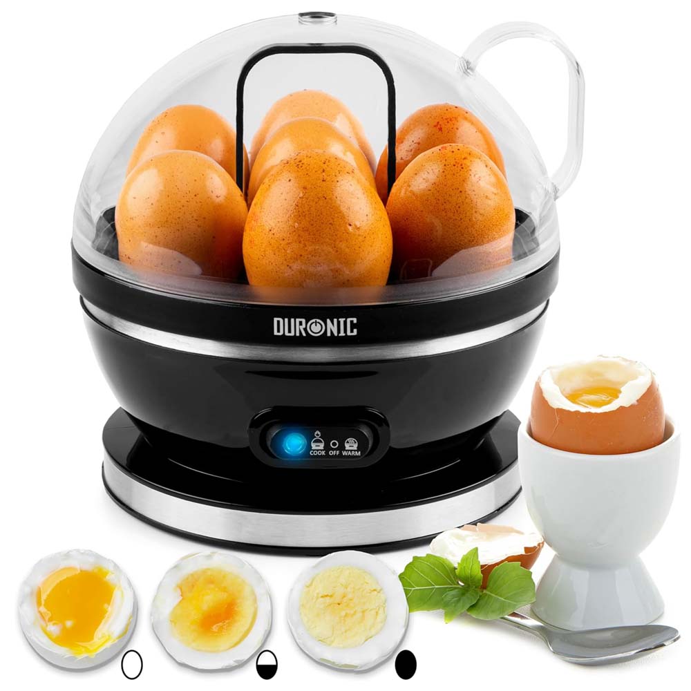 DURONIC egg cooker with eggs inside, surrounded by boiled eggs and a small cup.