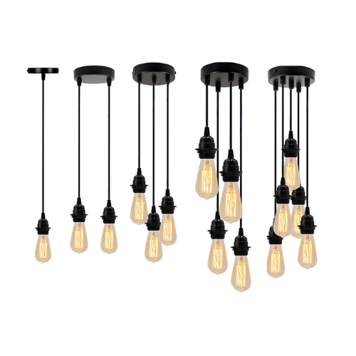 Vintage pendant light with PVC cord hanging in a cozy café.

