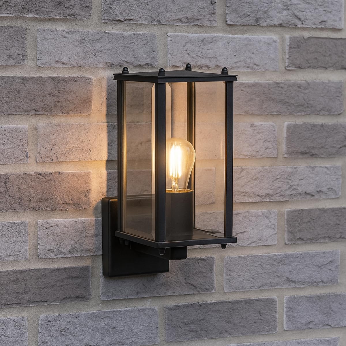 Upward black coach lantern wall light front view

