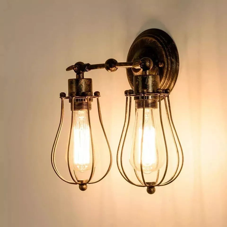 Retro industrial cage wall sconce mounted in a modern living room

