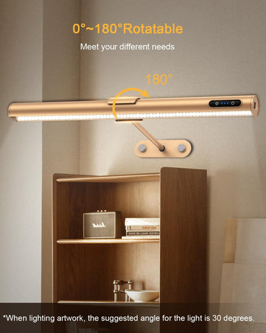 Wall-mounted LED light fixture with a rotatable design, mounted on a wall above a shelf.