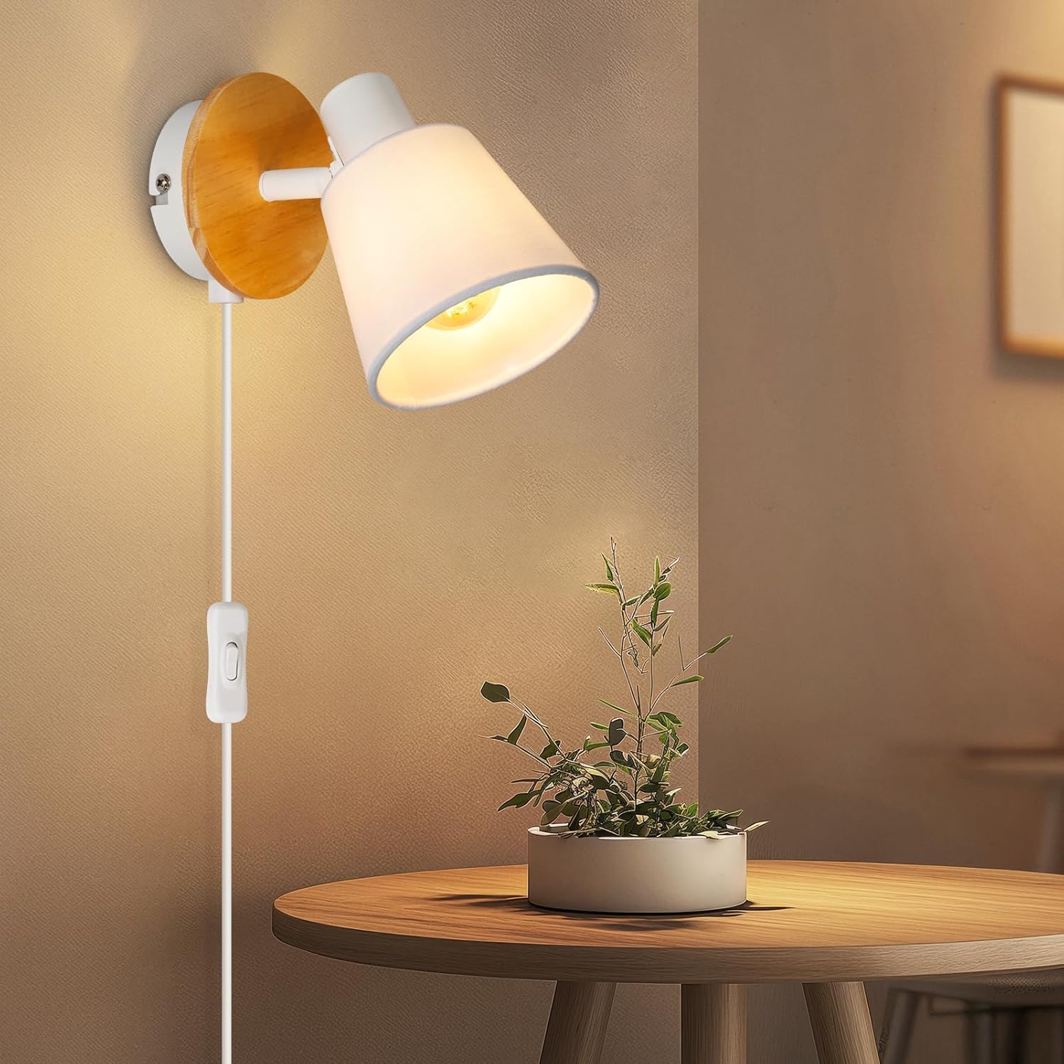 Wall-mounted lamp with wooden accent on a beige wall, next to a wooden table with a plant.