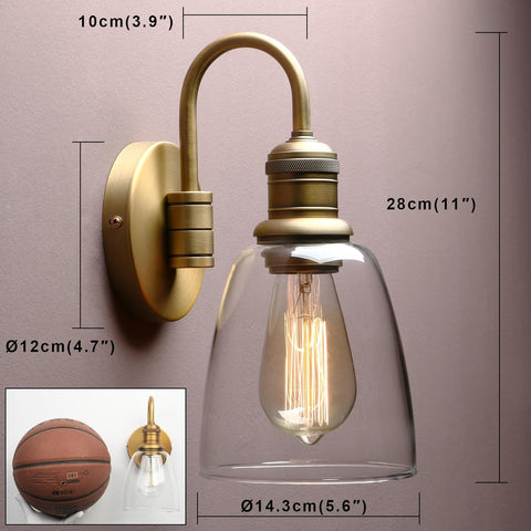 Wall-mounted light fixture with dimensions and a basketball for scale on a plain background