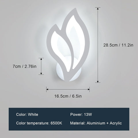 Wall-mounted light fixture with leaf design and dimensions on a gray background