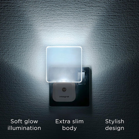 Wall-mounted night light with text highlighting features on a dark wall.