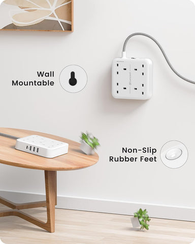 Wall-mounted power strip with non-slip rubber feet in a home setting