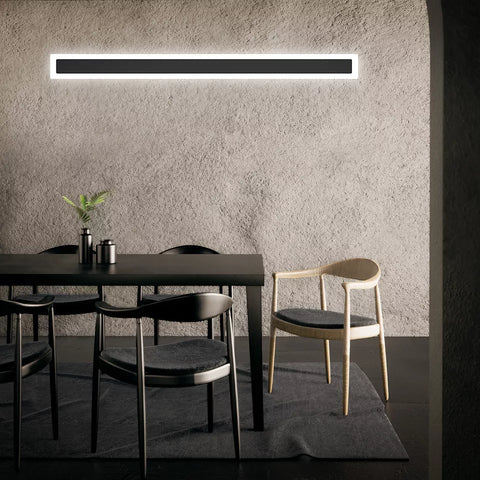 Stylish wall light providing cozy illumination in a bedroom setting

