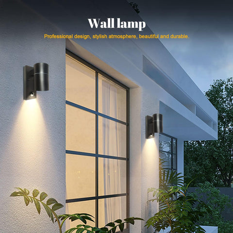 Wall lamp on a building exterior with text highlighting features