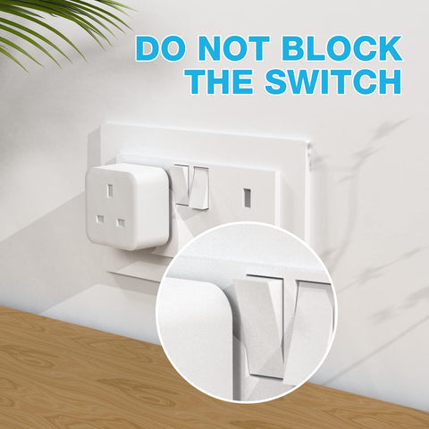 Wall socket with a plug inserted, surrounded by text 'DO NOT BLOCK THE SWITCH' on a light background.