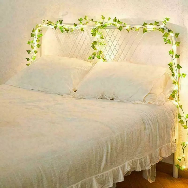 Romantic wedding backdrop with light-up ivy garland

