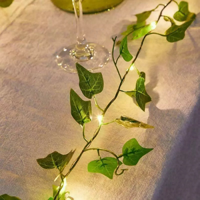 Battery-powered ivy string lights along staircase

