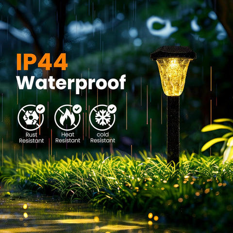Waterproof outdoor light fixture in a garden with rain, labeled IP44 and resistant to rust, heat, and cold.