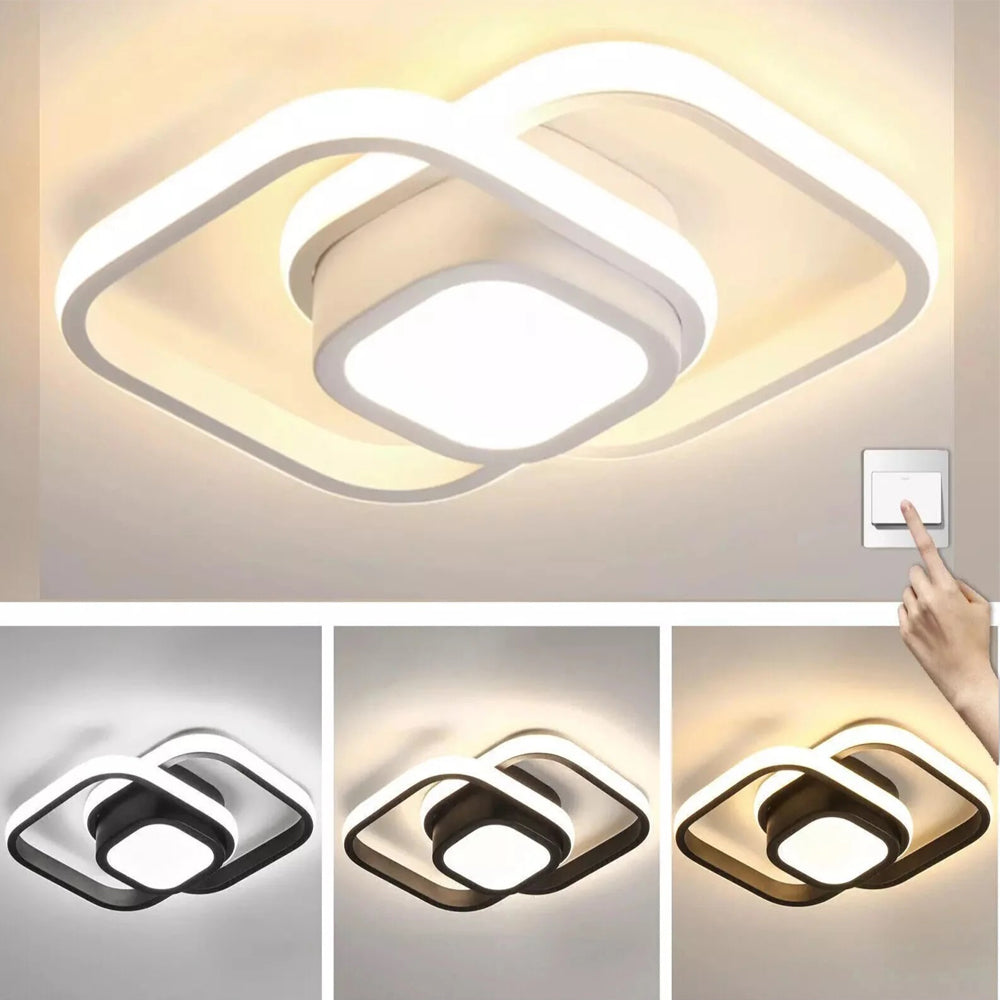 Ceiling light fixture with multiple color options and a hand pointing at it.