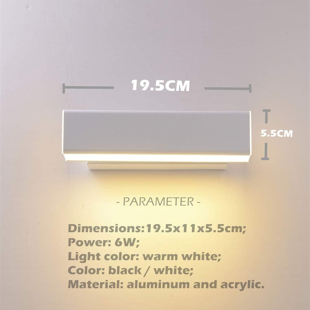  Energy-efficient LED wall light installed beside a bedside table