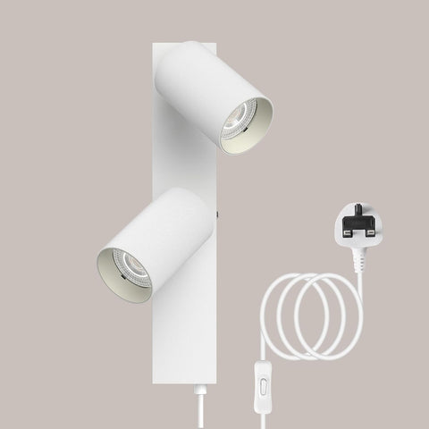 White ceiling light fixture with plug and socket on a beige background