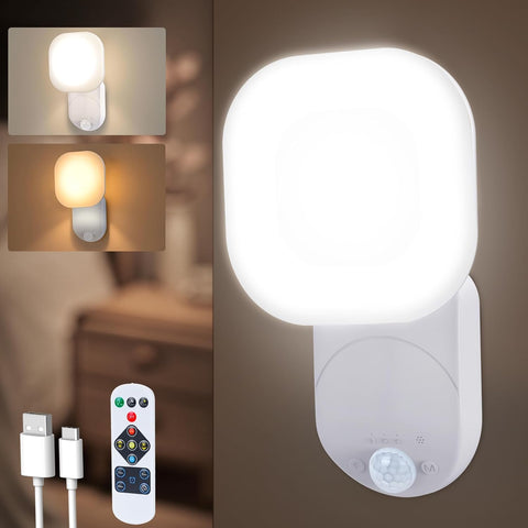 White night light with motion sensor, remote control, and charging cable on a brown background