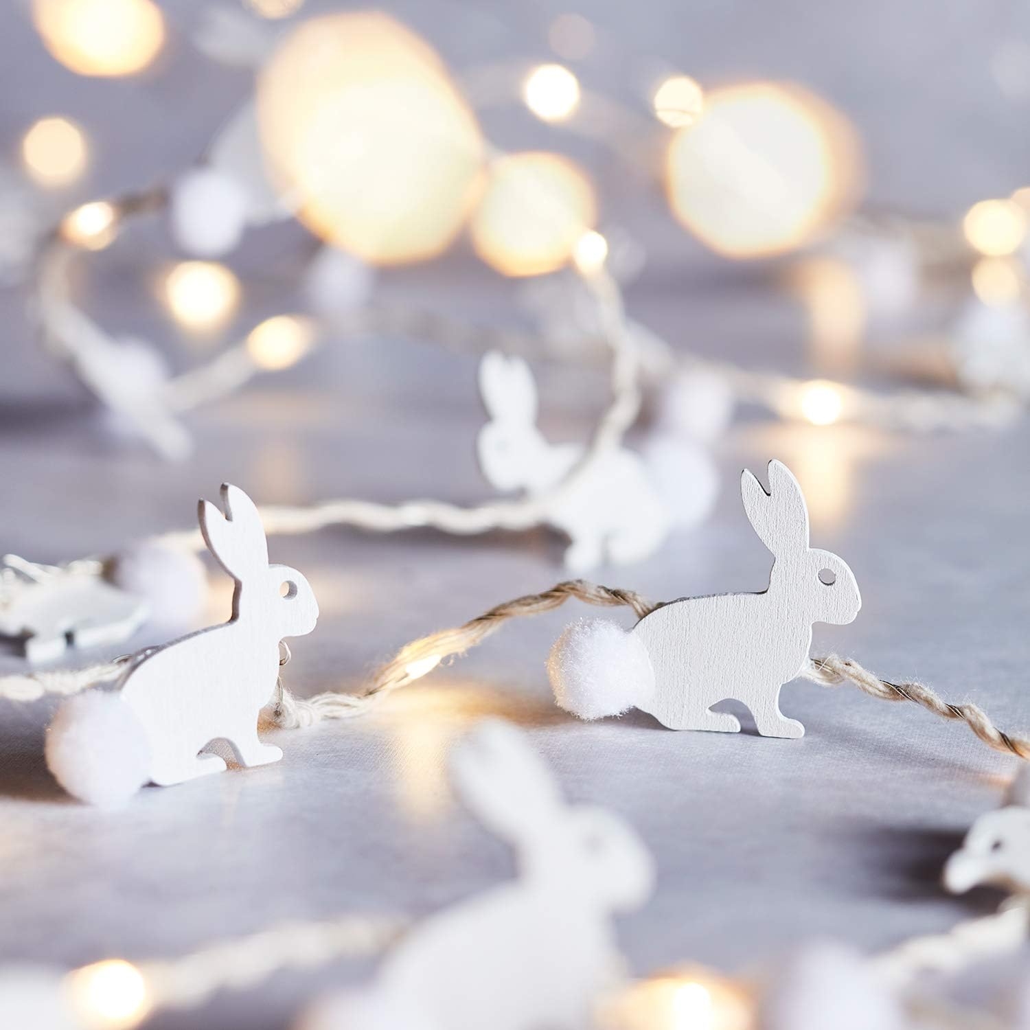 White wooden bunny LED lights on silver wire