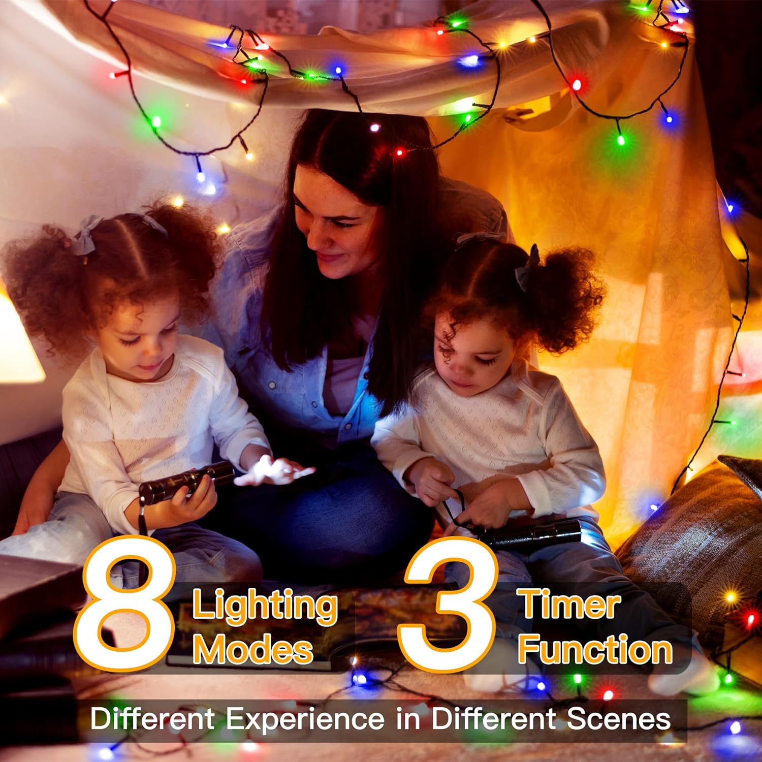 Woman and two children playing with a device under a blanket with colorful lights.