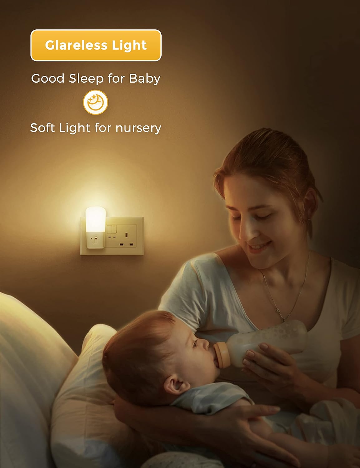 Woman feeding a baby with a bottle in a softly lit room, featuring a night light.
