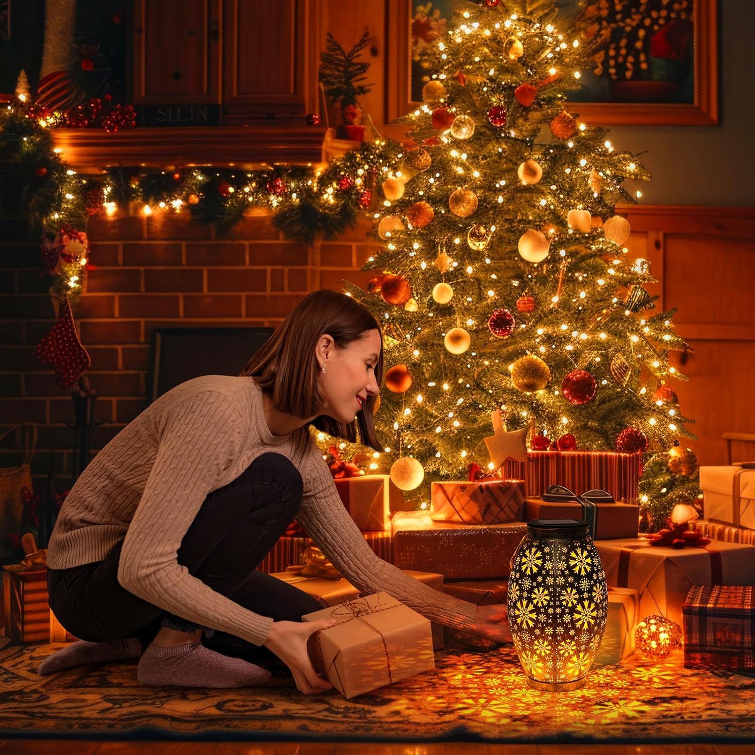 Woman opening a gift in a cozy living room decorated for Christmas.