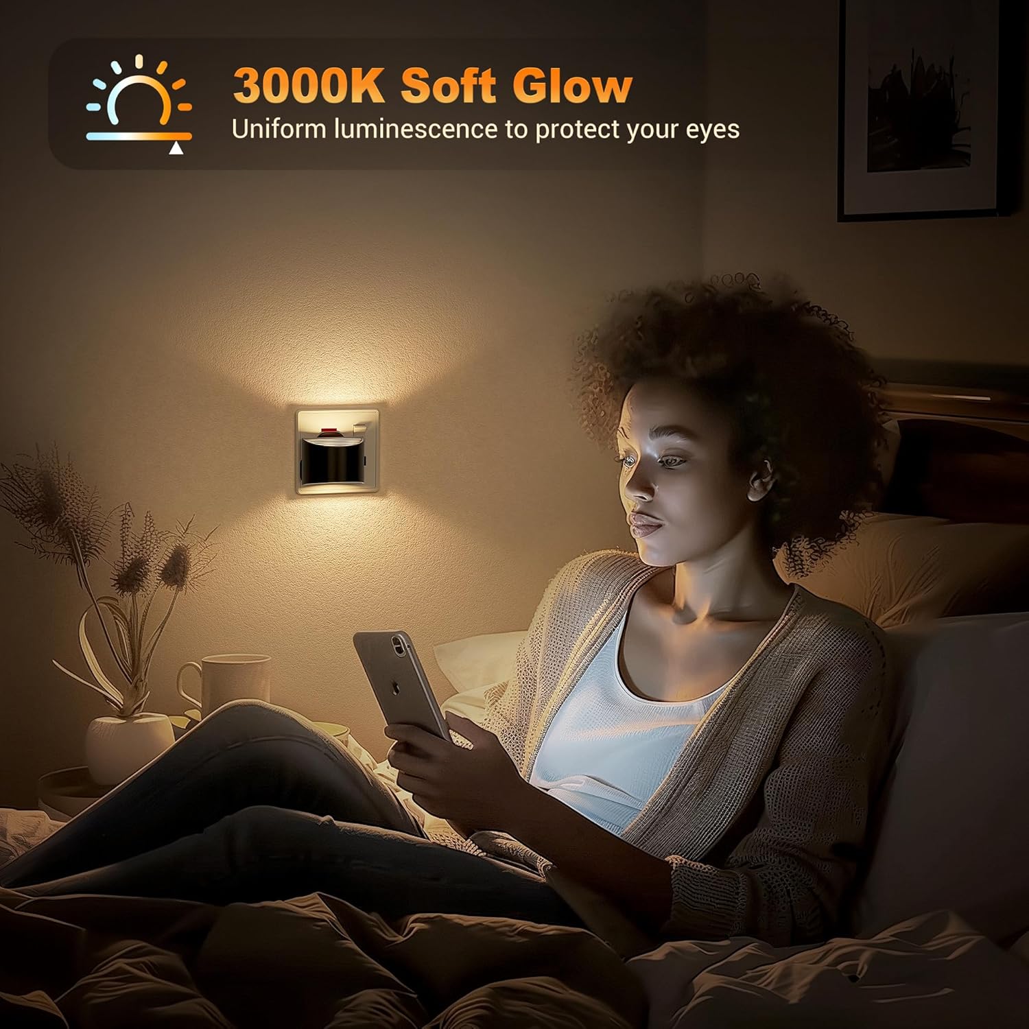 Woman using a smartphone in a dimly lit room with a wall light labeled '3000K Soft Glow'.