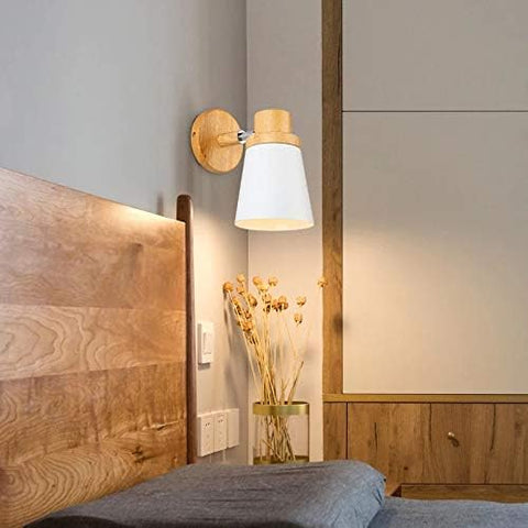  Soft, ambient glow from the wooden wall light in a bedroom setting
