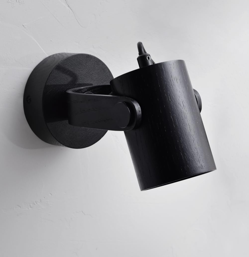 Wooden lamp with industrial look

Compact LED wall light design

