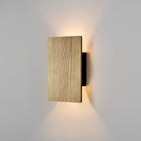 Wooden wall light fixture on a gray background