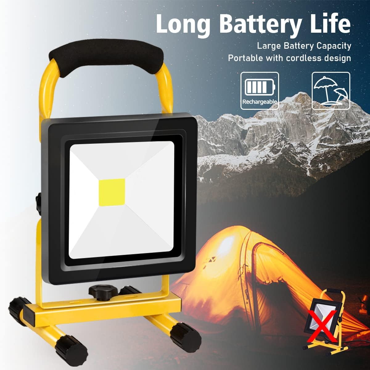Yellow and black portable work light with mountain and person in dark setting background