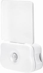 Sleek plug-in LED light illuminating hallway with dusk to dawn sensor
