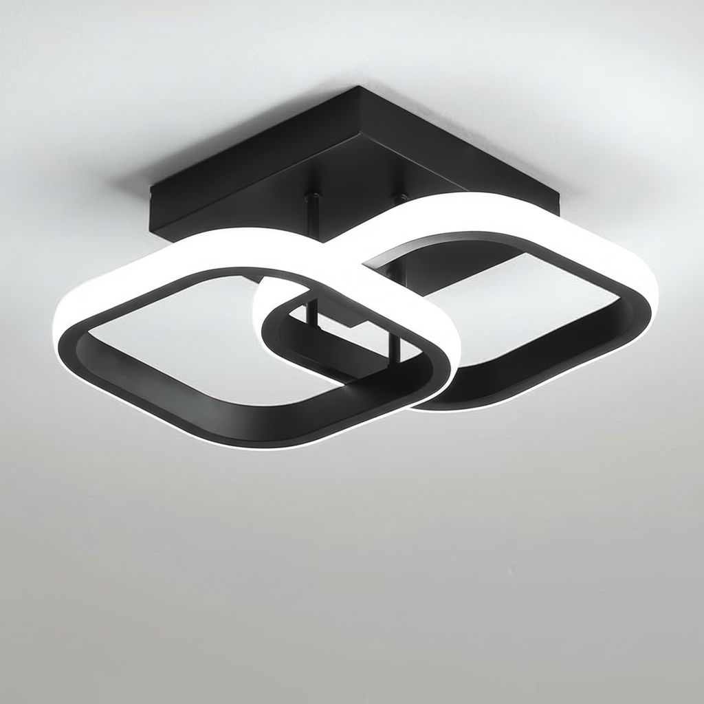 Modern ceiling light fixture with black and white design on a neutral background