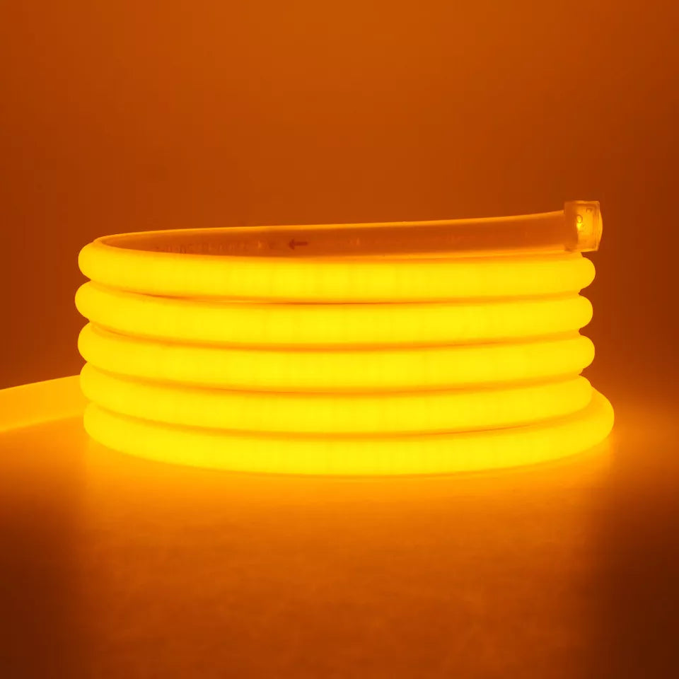 IP67 LED rope light illuminating a pathway in warm and RGB tones.


