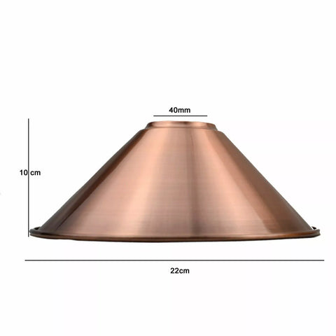 Chrome finish industrial pendant light over a minimalist workspace