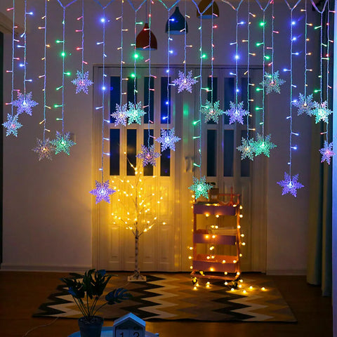 Snowflake lights glowing against a dark backdrop

