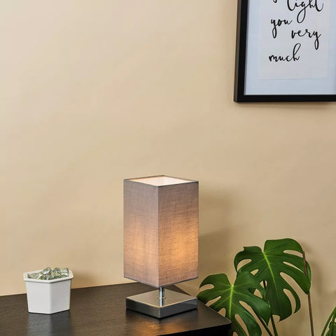 Lamp in different color options: Grey, White, and Black.​

