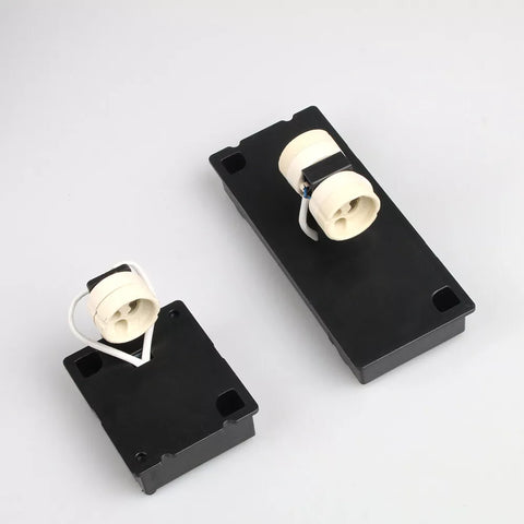 Alpha Lights Modern Wall Light mounted beside a garage door

