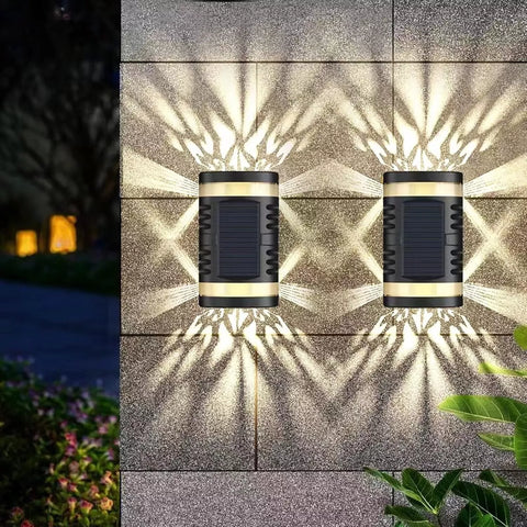 Super bright solar wall light mounted on garden fence

