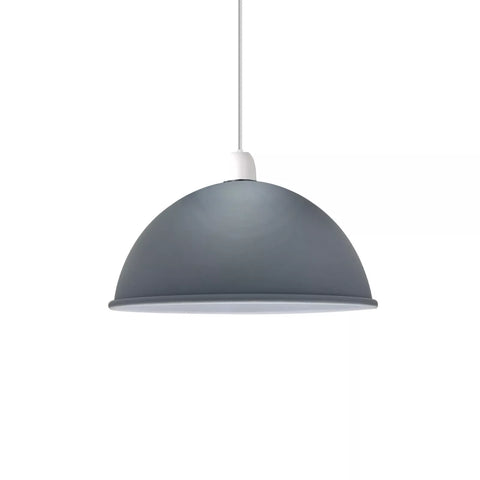 Black dome pendant light hanging above a kitchen island


