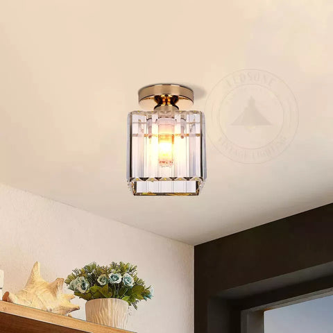 LED crystal light fixture with cool white glow


