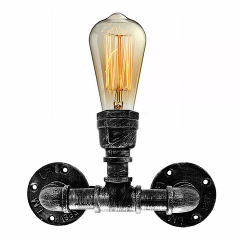Steampunk-inspired wall lamp with Edison-style bulb glowing warmly in a cozy setting.