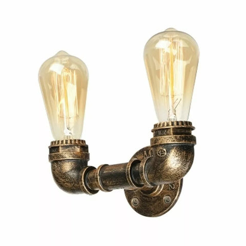Retro-style metal pipe wall sconce adding a warm, industrial touch to home decor
