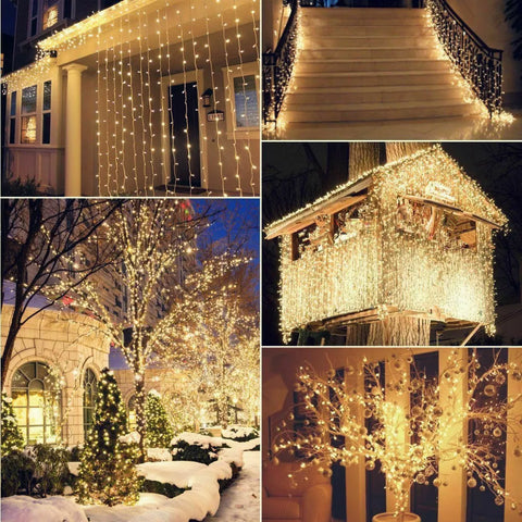 LED fairy lights hanging on a garden wall

