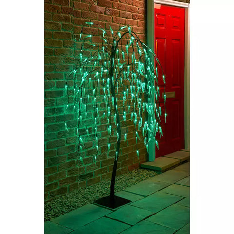 Outdoor branch light on lawn at night


