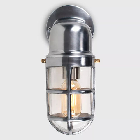 Traditional outdoor light beside garage door

