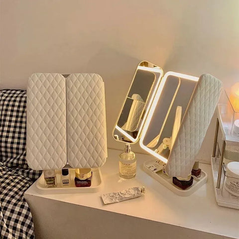 Close-up of touch sensor controls on LED makeup mirror.

