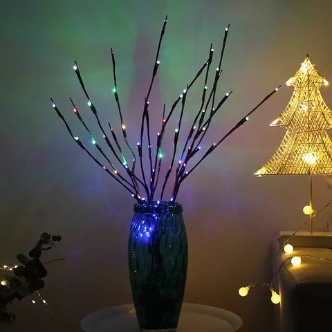20 LED Twig Branch Fairy Light in a decorative vase on a tabletop


