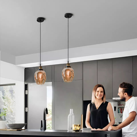 Elegant Hanging Light Providing Warm White Illumination




